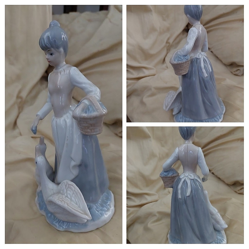 Porcelain Figurine.. 8.5" T ... Unbranded